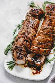 Roast Pork Tenderloin With A Savory Balsamic Glaze Looks Elegant On The Christmas Ta In 2020 Balsamic Pork Tenderloins Roasted Pork Tenderloins Pork Tenderloin Recipes