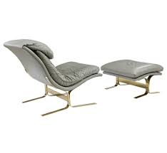 It swivels and features a curved aluminum frame. Italian Leather Lounge Chair And Ottoman