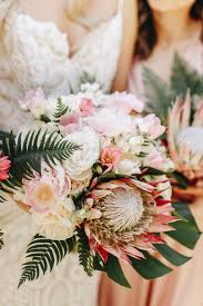 We're laid back & like pretty things! Tropical Wedding At Sydonie Mansion Orange Blossom Bride Tropical Wedding Bouquets Tropical Wedding Tropical Wedding Flowers