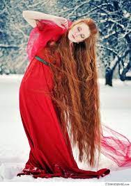 Beautiful long hair brunette on the plein air. Redheads Make St Patrick S Day More Festive Long Hair Styles Long Red Hair Extremely Long Hair