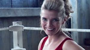 ► a woman looks at a man lustily and tries to seduce him, he smiles, she swoons, he runs away, and she chases him. New Trending Gif On Giphy Follow Jagilsdorf For More Jagilsdorf Com Betty Gilpin Gorgeous Ladies Of Wrestling Smile Gif