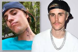On friday, wall posted some other picture, this considered one of him and his mom with. Justin Bieber Fans Distraught As Singer Ruins Himself With Daring Neck Tattoo Mirror Online