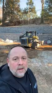 Massive progress today at our Glen Head project., By clearing out the  overgrowth and pushing back the slope with this custom retaining wall,  we’ve essentially handed these homeowners a brand-new ...