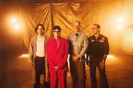 Weezer Announce New (Gold) Album: Hear “We Might As Well Be Strangers” (Feat. Wednesday)