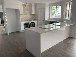 White Gloss Kitchen Stone Benchtops And Waterfall White Gloss Kitchen Kitchen Inspirations Kitchen Benchtops
