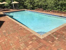 When it comes to convenience, appearance and durability, pool deck pavers are ideal. Beautifully Accent Your Blue Pool With A Paver Paver Deck Made With Pathway Full Range Thin Pavers Brick Pavers Pool Pavers Red Brick Pavers