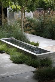 Landscape Architect Visit A Refined Family Garden With Flexible Play Zones In La S Pacific Palisades Gardenista Water Features In The Garden Family Garden Modern Landscaping