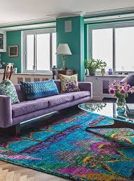 20 New York Designers Share Their Favorite Apartments Refinery29 Purple Living Room Living Room Carpet Blue Sofas Living Room