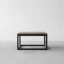 Add a large arrangement of tulips to one side. Edward Leather Top Coffee Table