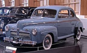 The hogan collection's 1942 21a super deluxe tudor sedan is black with vermillion striping and beige cloth interior. Pin On Ford Early V 8s