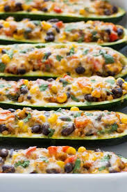 Mexican Zucchini Burrito Boats Zucchini Burrito Boats Are A Simple Meatless And Glu Mexican Zucchini Spaghetti Squash Recipes Vegan Delicious Healthy Recipes