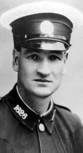 My grandfather Tom Withey in a standard British army uniform, standing  outside his house in Bournville (77), during WW2. As indicated by the crown 