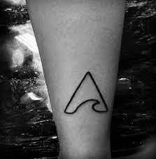 Top 43 Simple Wave Tattoo Ideas 2021 Inspiration Guide Simple Wave Tattoo Wave Tattoo Design Wave Tattoo Ideas