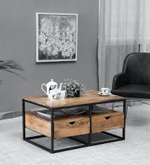 Custommade live edge coffee tables are handcrafted by expert craftsmen with quality made to last. Buy Yurok Solid Wood Coffee Table In Natural Finish With Bronze Frame Bohemiana By Pepperfry Online Industrial Rectangular Coffee Tables Tables Furniture Pepperfry Product