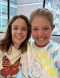 Ask Katie Carr to tell you about herself, and she'll start by introducing  "Leslie" — her glittery, bright pink prosthetic leg. Then, her faith,  family, and love for community quickly shine through. "