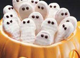 Remember when i made that white chocolate peanut butter? Nutter Butters Dipped In White Chocolate Halloween Sweet Treats Halloween Goodies Halloween Treats