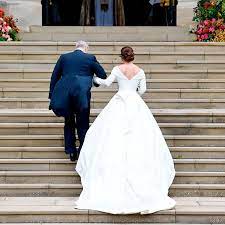 The queen's granddaughter was diagnosed with scoliosis and underwent corrective surgery aged just 12. Princess Eugenie S Wedding Dress Showed Off Her Scars For A Reason Vanity Fair
