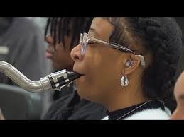 Hard-of-hearing West Brook High School band member says music is like her  therapy