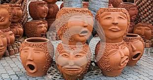 Pattaya Thailand November 10 The Strange Pots Sculpture Look Like Human Face In Nong Nooch Tropical Garden On Nov Sculpture Clay Pot Projects Face Planters