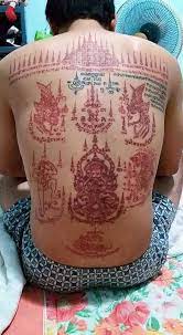 Sak Yant Thai Tattoo Symbols On A Man S Back Red Ink Thai Tattoo Red Ink Tattoos Thai Tattoo Khmer Tattoo