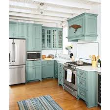 Light Blue Green Farmhouse Kitchen A Great Way To Add Interest And Color Beach Cottage Kitchens Teal Kitchen Cabinets Cottage Kitchens