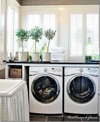 Southern Style Decorating Ideas From Southern Living Thistlewood Farms Stylish Laundry Room Southern Living Homes White Laundry Rooms