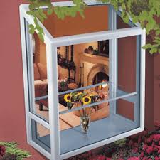 With a second person helping, fit the garden window into place. Garden Windows San Diego Installation Replacement