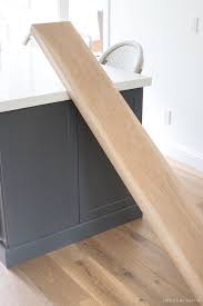 White oak floating shelves kitchen. The Floating Corner Shelves In Our Kitchen All The Details Driven By Decor