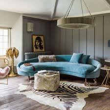 13 Rooms Rocking The Curved Furniture Trend Hunker Curved Sofa Living Room Round Sofa Curved Furniture
