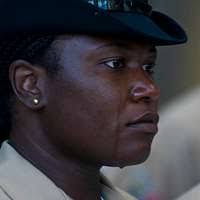 Chief Aviation Electronics Technician Felicia Oliver sheds a tear after  being pinned during a chief petty officer pinning ceremony at Naval Air  Station Patuxent River.