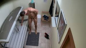 Naked hunk in the tanning bed! - SpyCamDude