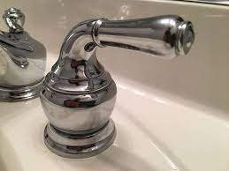 Sinks—and running water in general—are wonderful things. Leaky Bathroom Faucet Can T Find Screw On Handle Home Improvement Stack Exchange