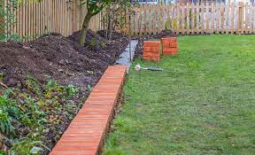 Staggered lattice nailing to ensure maximum hold. How To Install Brick Edging The Home Depot