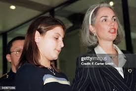 Gymnast Dominique Moceanu and her attorney Ellen Yarrell. News Photo