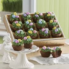 Rich Fudgy Mini Brownies Are Meticulously Hand Decorated With Icing Greenery And Candied Peanut Eggs Easter Nests Decorated Brownies Food Gifts