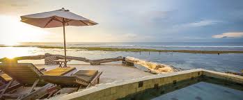 The beach nestles beneath the 1. Impossibles Seaview Rooms Surf Hotel Bukit Peninsula Bali Indonesia