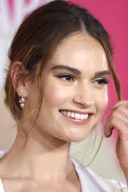 Occasionally friendly and funny and hides potentially charming qualities however is largely offensive and short tempered with a tendency to spout expletives and insults at any given opportunity. Lily James Wikipedia