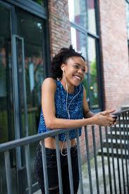 Our balustrades are manufactured in south africa and can be viewed at our showroom in blackheath, between cape town and. Happy Young African Woman On Her Balcony By Bo Bo Stocksy United