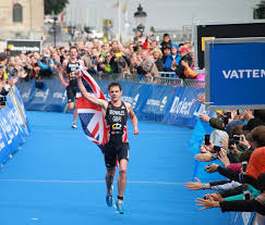 Alistair brownlee helps his brother over the finish line. Jonathan Brownlee Photos Free Royalty Free Stock Photos From Dreamstime