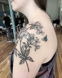 There are an unlimited number of things that a butterfly tattoo on the left shoulder could symbolize. Top 47 Best Honeysuckle Tattoo Ideas 2021 Inspiration Guide In 2021 Honeysuckle Tattoo Flower Tattoo Shoulder Tattoos
