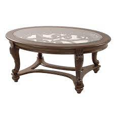 This set includes one oval coffee table and one round end table. Norcastle Oval Coffee Table El Dorado Furniture