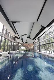 50 Beautiful Indoor Swimming Pool Design Ideas For Your Home Architecture Ceiling Indoor Swimming Pools Swimming Pools