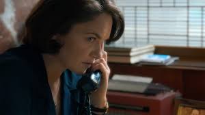 Four people gather in the impressive foyer: Oslo About The Show Amblin