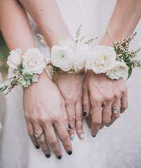 The Most Stunning Ranunculus Arrangements For Your Wedding Mywedding Bridesmaid Corsage Corsage Wedding Alternative Bridesmaid