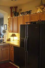 Attach them upwards, downwards or around. 25 Awesome Ways To Use String Lights In Kitchens Digsdigs
