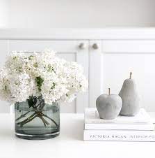 Single low bowl with flowers. Coffee Table Flower Arrangement Coffe Table Decor Coffee Table Flowers Arrangements Coffee Table Books Decor