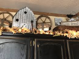 Maybe you would like to learn more about one of these? Farmhouse Lighted Garland Above Cabinets Decor Above Cabinet Decor Garland Above Kitchen Cabinets Cabinet Decor