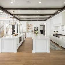 Our island kitchens assure a harmonious relation between the kitchen and the living area for your home. Double Kitchen Islands Design Ideas