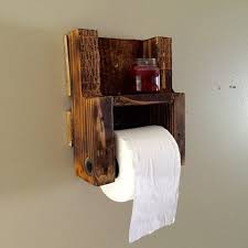 Moen® vale wall mount toilet paper holder. A Rustic Wall Mounted Wooden Toilet Paper Holder With Shelf The Wood Is Toilet Paper Holder Wooden Toilet Paper Holder Rustic Toilet Paper Holders