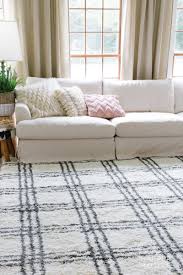 Black And White Farmhouse Rug Our New Black And White Farmhouse Rug Layered On Carpet Under 350 For 9x12 See Full Shopping Sources On The B Black White Rug White Rug Rugs In Living Room